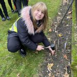 Students showing their repspects at Stockton Garden of Remembrance.