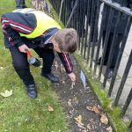 Students showing their repspects at Stockton Garden of Remembrance.