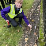 Students showing their repspects at Stockton Garden of Remembrance.