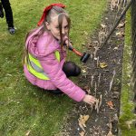 Students showing their repspects at Stockton Garden of Remembrance.
