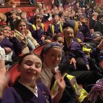 Students sitting in Theatre awaiting the start of War Horse.