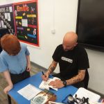 Matt Goodfellow, Poet signing students books.