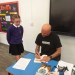 Matt Goodfellow, Poet signing students books.