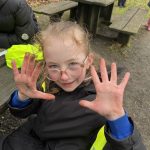 Student showing er dirty hands.