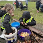 Students making bird food.