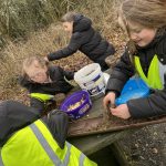 Students making bird food.